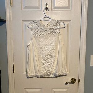 TINY size Large women’s white top! So cute on.